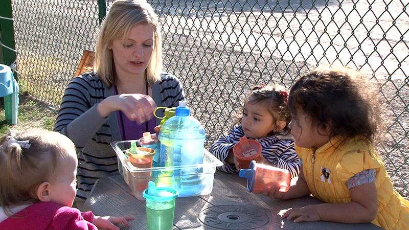 toddlers relaxing in shade