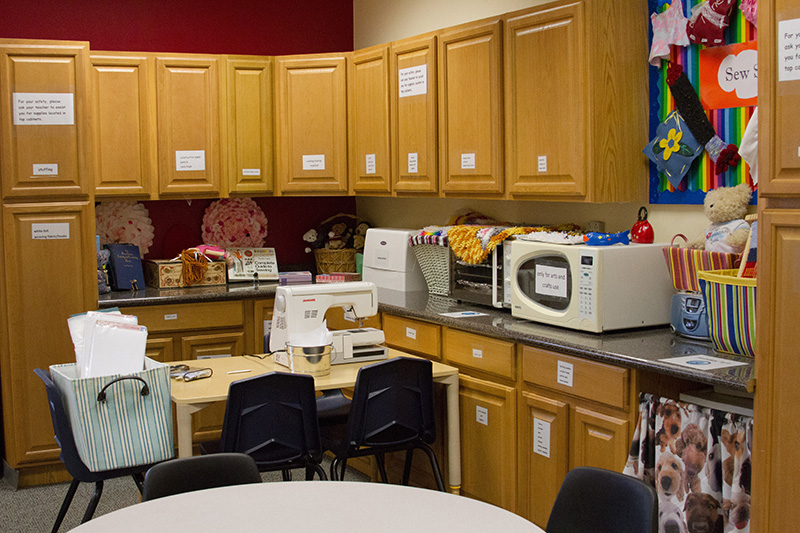 A learning environment is set up with crafting tools and spaces